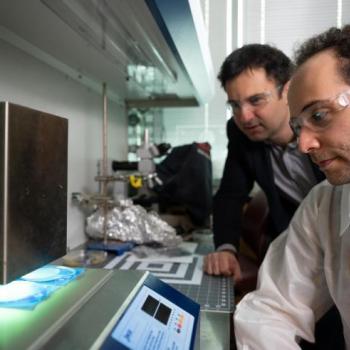  Fabrication of the microchip. The device is fabricated by injecting a polymer into a micro fabricated mold and the polymer is cured under ultraviolet light to produce low-cost, single-use devices.